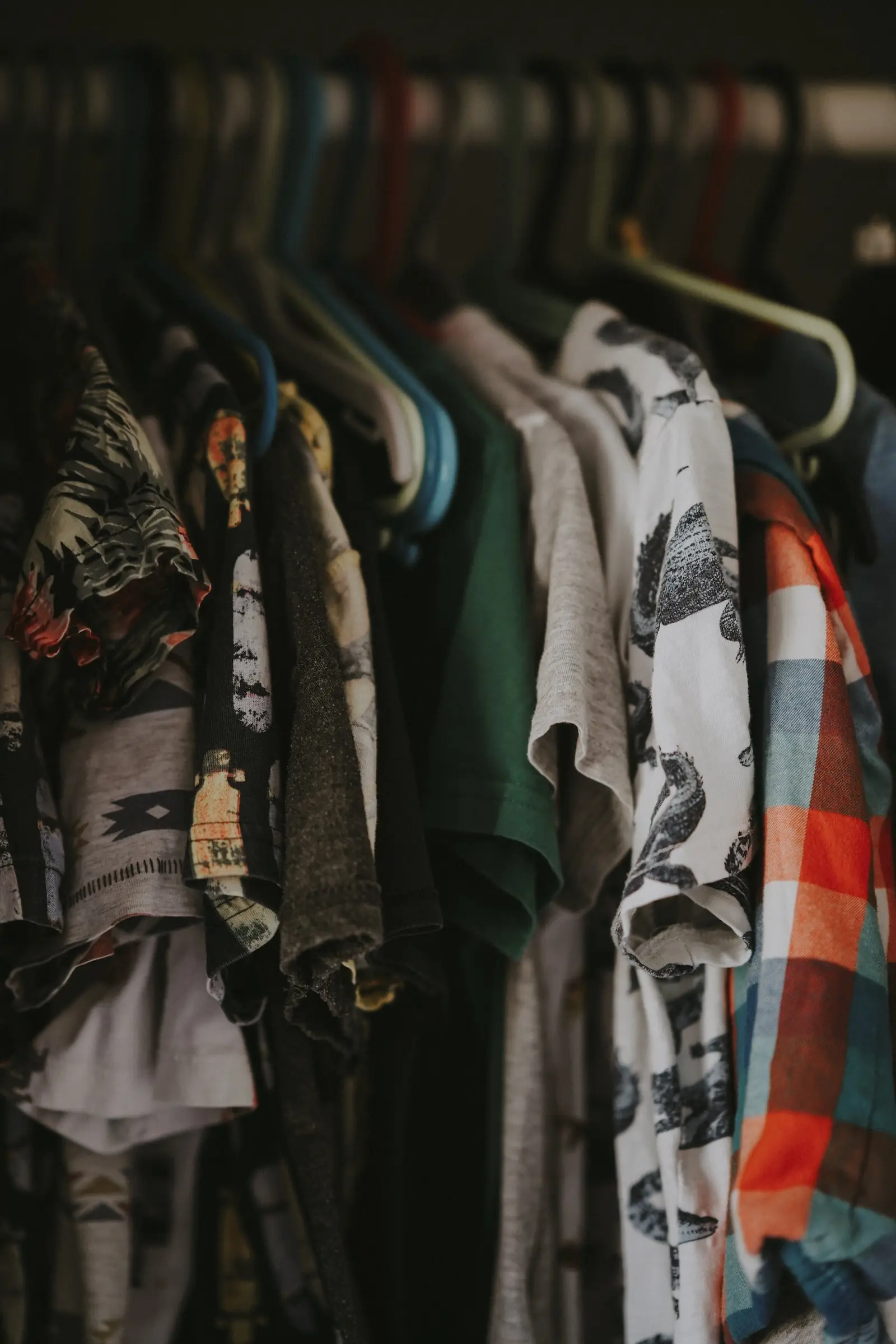 A rack of donated shirts and jackets